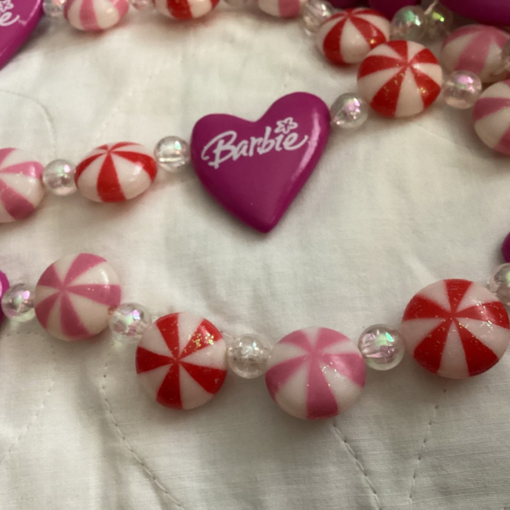 Barbie Garland…hearts with Barbie on them and striped candy replicas.